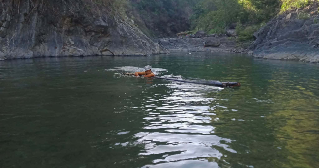 People enjoying a river as an outdoor activity in the Philippine province
